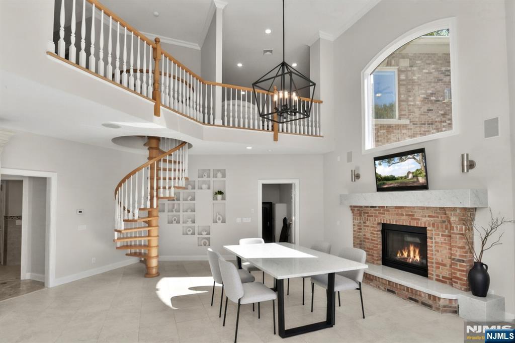 14 Werimus Brook Road Saddle River, NJ 07458 - Photo 12 of 50 a view of a livingroom with furniture and staircase