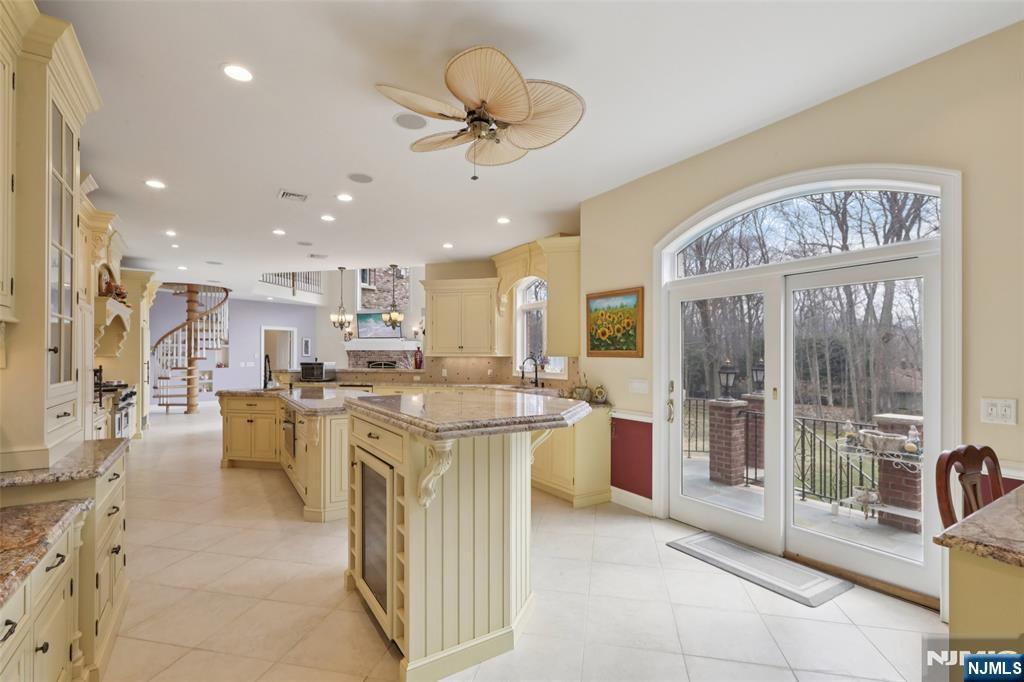 14 Werimus Brook Road Saddle River, NJ 07458 - Photo 16 of 50 a large kitchen with a large counter top appliances and cabinets