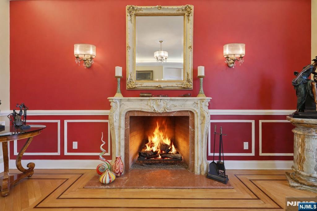 14 Werimus Brook Road Saddle River, NJ 07458 - Photo 19 of 50 a living room with furniture and a fireplace