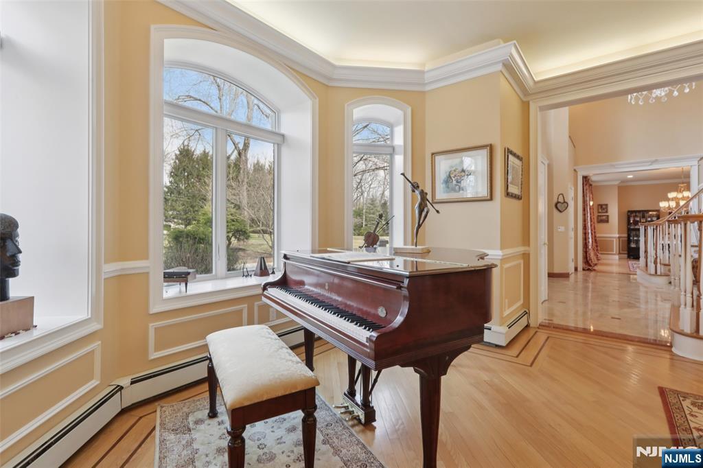 14 Werimus Brook Road Saddle River, NJ 07458 - Photo 21 of 50 a living room with furniture and a window