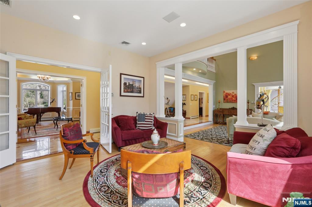 14 Werimus Brook Road Saddle River, NJ 07458 - Photo 27 of 50 a living room with furniture and wooden floor