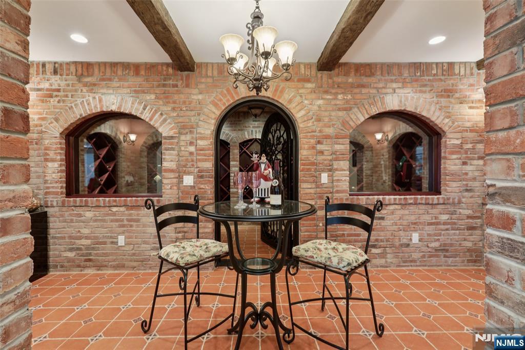 14 Werimus Brook Road Saddle River, NJ 07458 - Photo 47 of 50 a view of a two chairs and a fountain