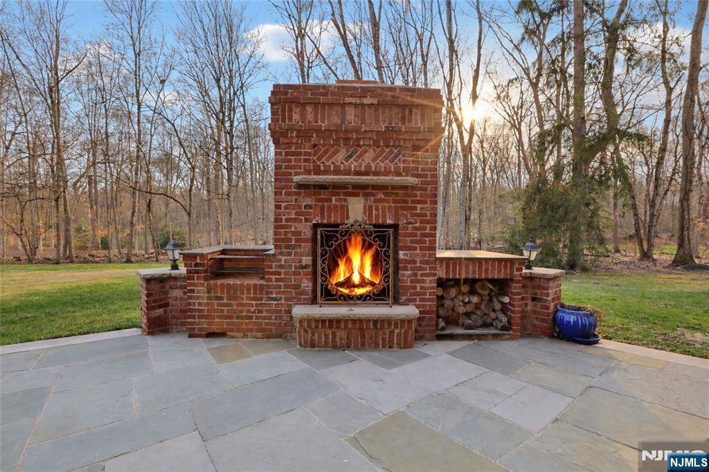 14 Werimus Brook Road Saddle River, NJ 07458 - Photo 48 of 50 front view of a house with a yard