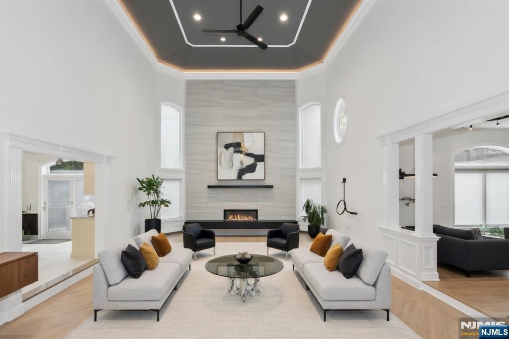 14 Werimus Brook Road Saddle River, NJ 07458 - Photo 6 of 50 a living room with furniture and a couch