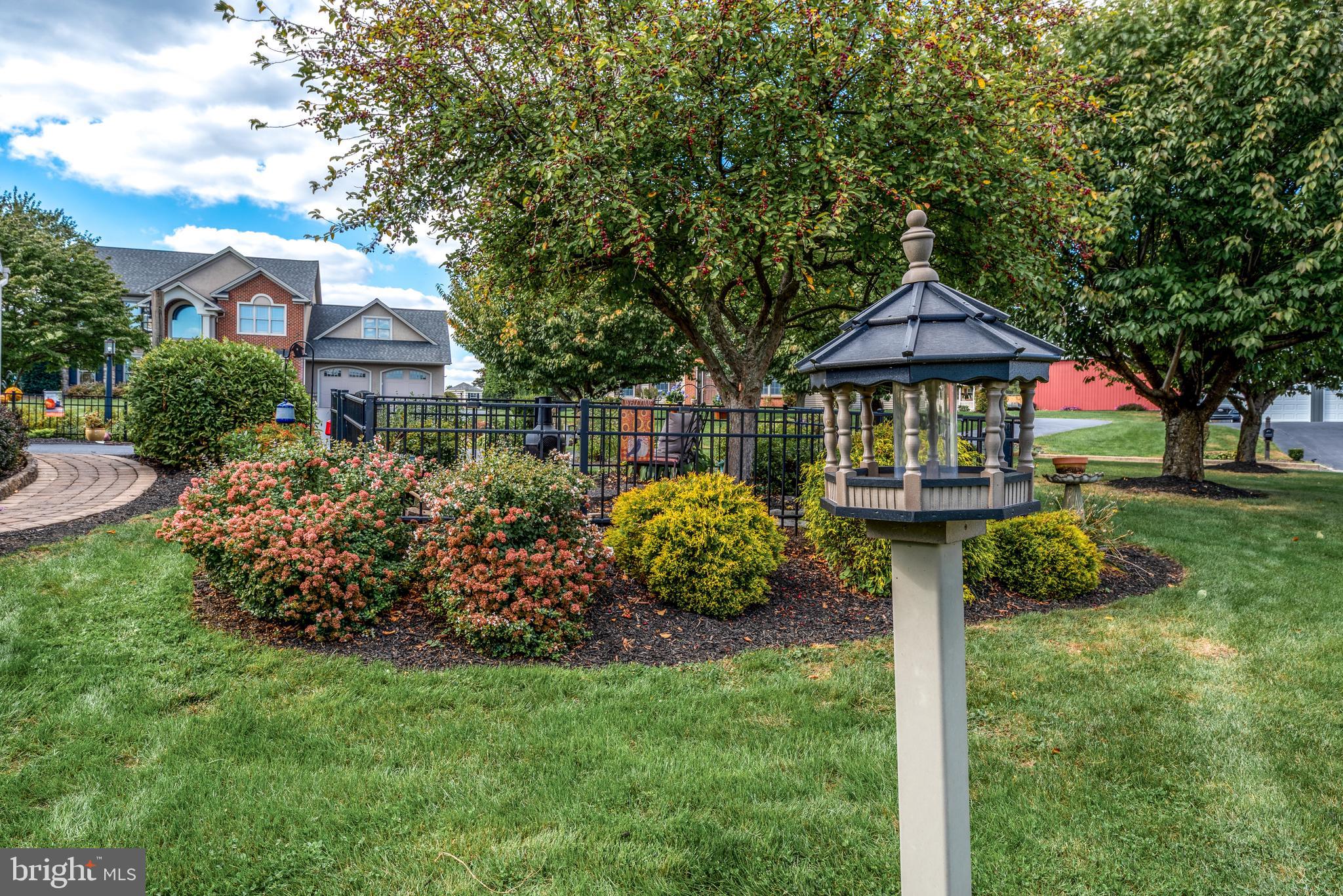 5 Village Drive Lititz, PA 17543 - Photo 50 of 62 a front view of a house with garden
