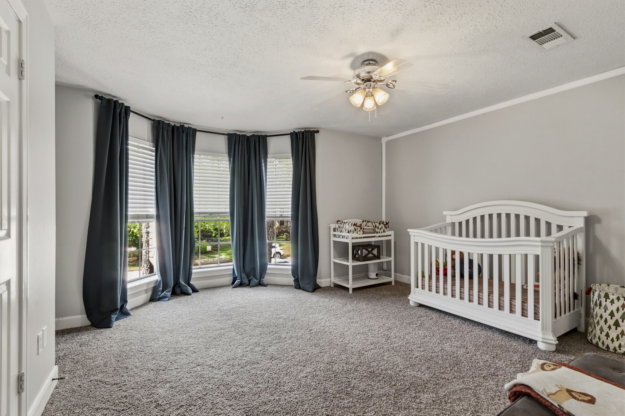 17618 Hidden Forest Drive Spring, TX 77379 - Photo 36 of 49 a view of a bedroom with furniture and windows