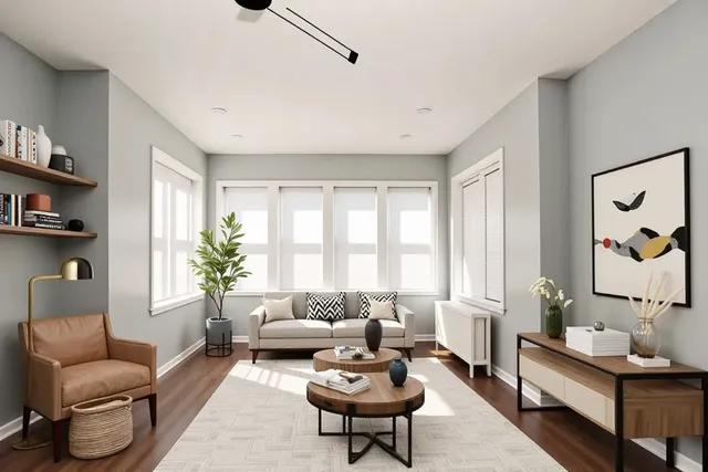 a living room with furniture and a potted plant