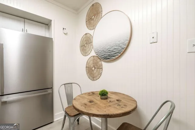 a table and chairs in a kitchen