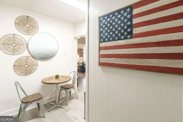 a stove top oven sitting inside of a kitchen