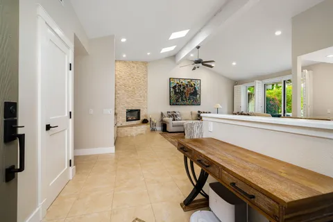 a very nice looking dining room with a table and chairs