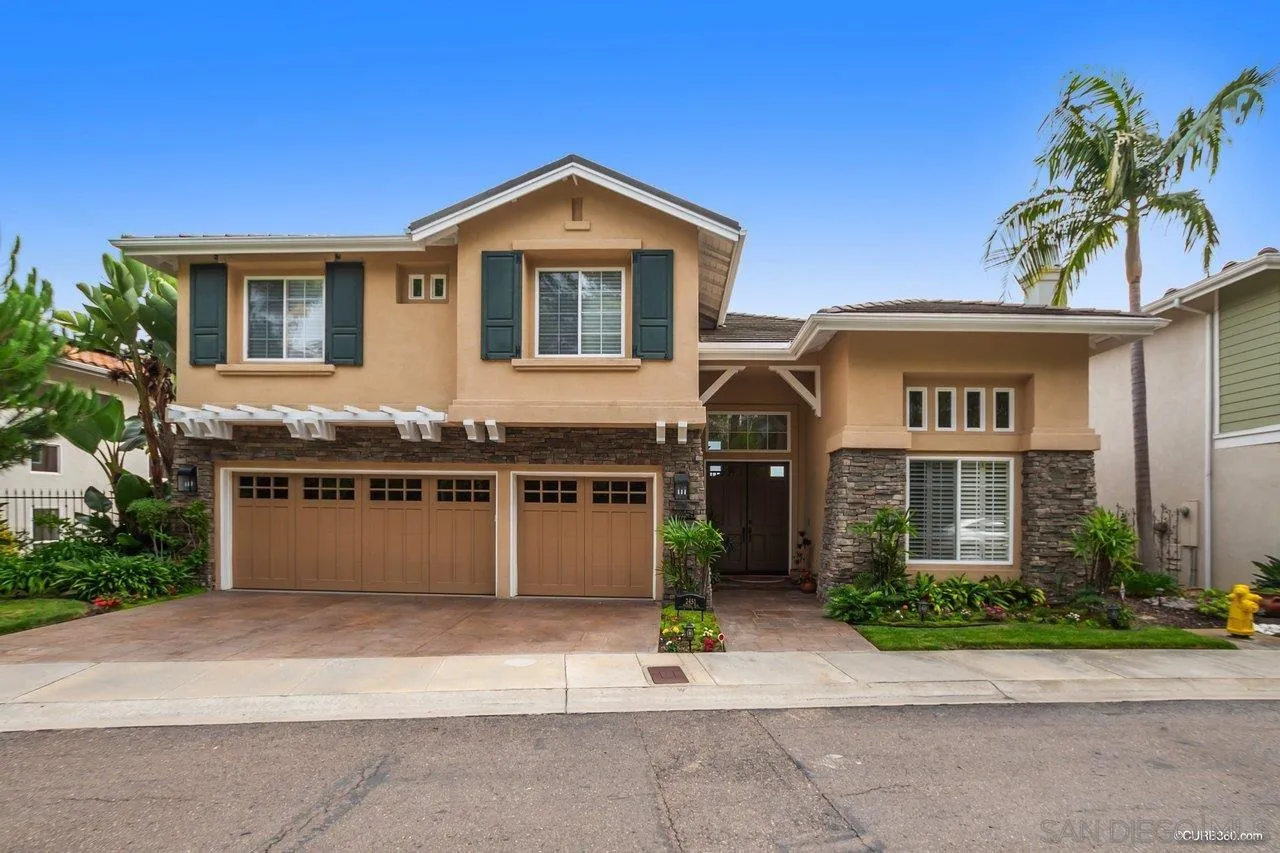 2451 Selkirk Row La Jolla, CA 92037 - Photo 1 of 37 a front view of a house with a garden