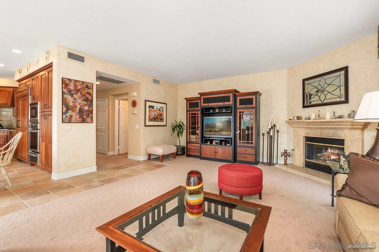 2451 Selkirk Row La Jolla, CA 92037 - Photo 11 of 37 a living room with furniture and a fireplace