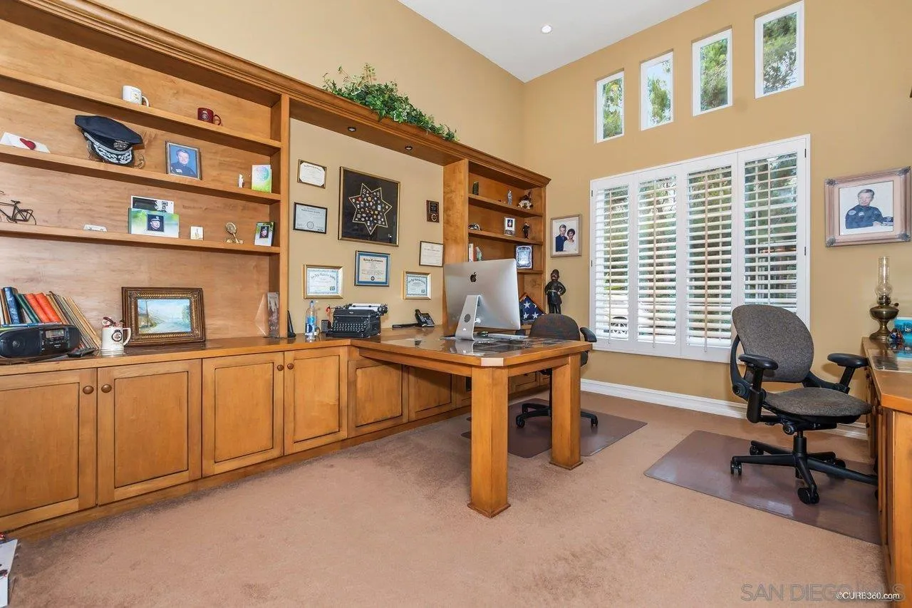 2451 Selkirk Row La Jolla, CA 92037 - Photo 29 of 37 a view of a livingroom with workspace and a window