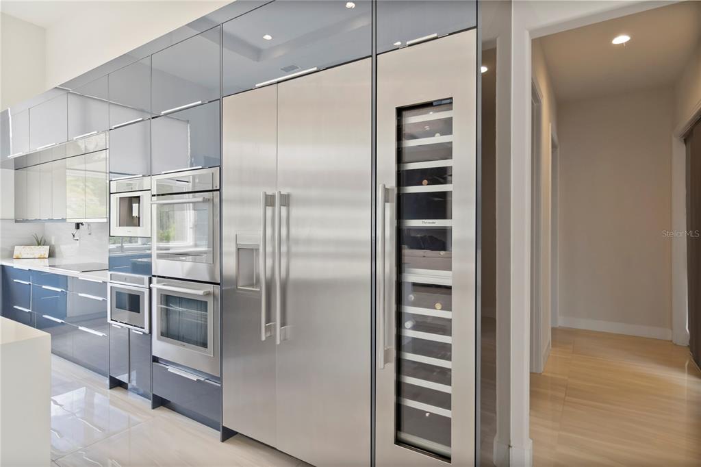 113 Spring Rise Circle Bunnell, FL 32110 - Photo 11 of 45 a kitchen with stainless steel appliances and a refrigerator