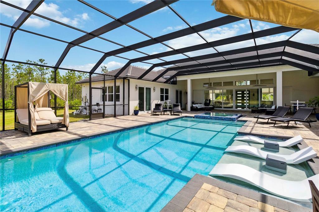 113 Spring Rise Circle Bunnell, FL 32110 - Photo 2 of 45 a view of a swimming pool with a patio