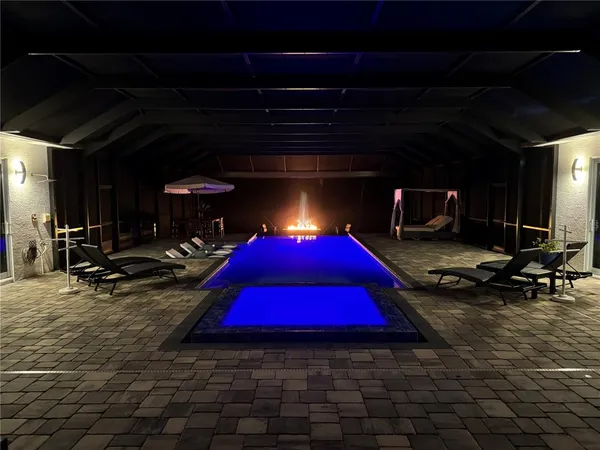 a room with gym equipment and a table