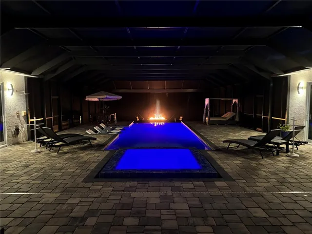 a room with gym equipment and a table