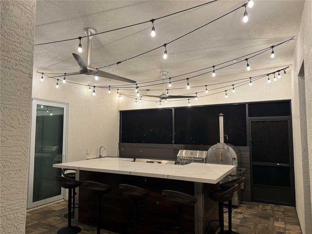 113 Spring Rise Circle Bunnell, FL 32110 - Photo 36 of 45 a kitchen with a table and chairs