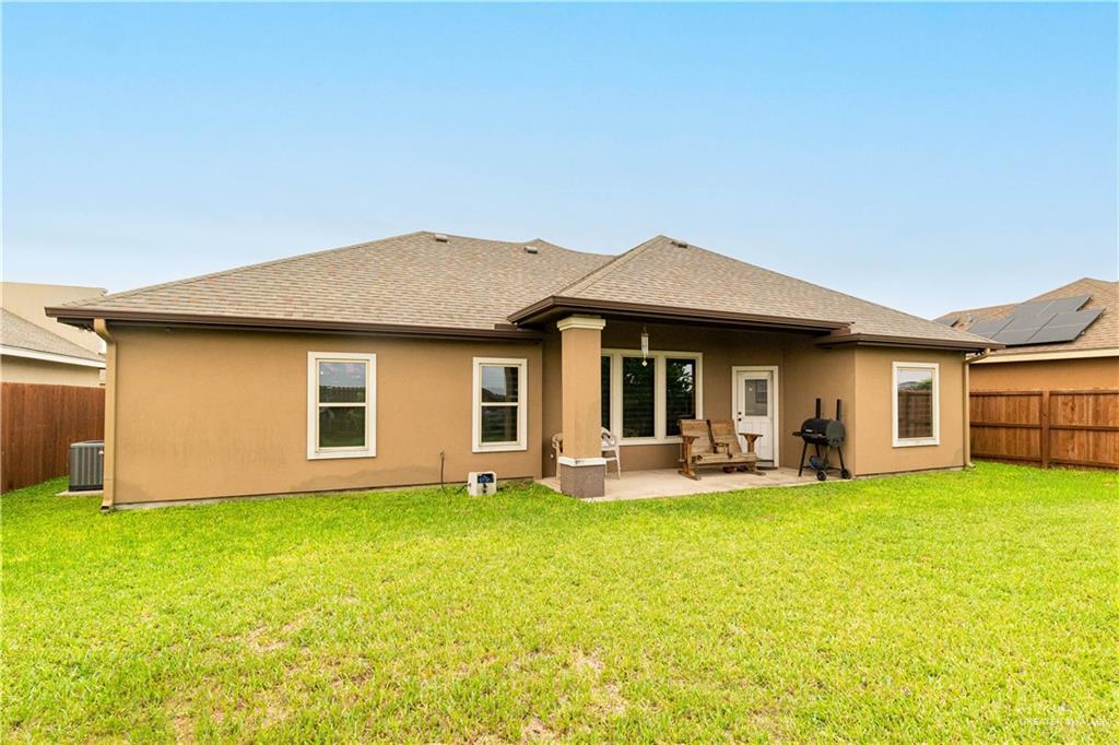 3902 Sherman Street Edinburg, TX 78542 - Photo 14 of 20 a front view of a house with yard and porch