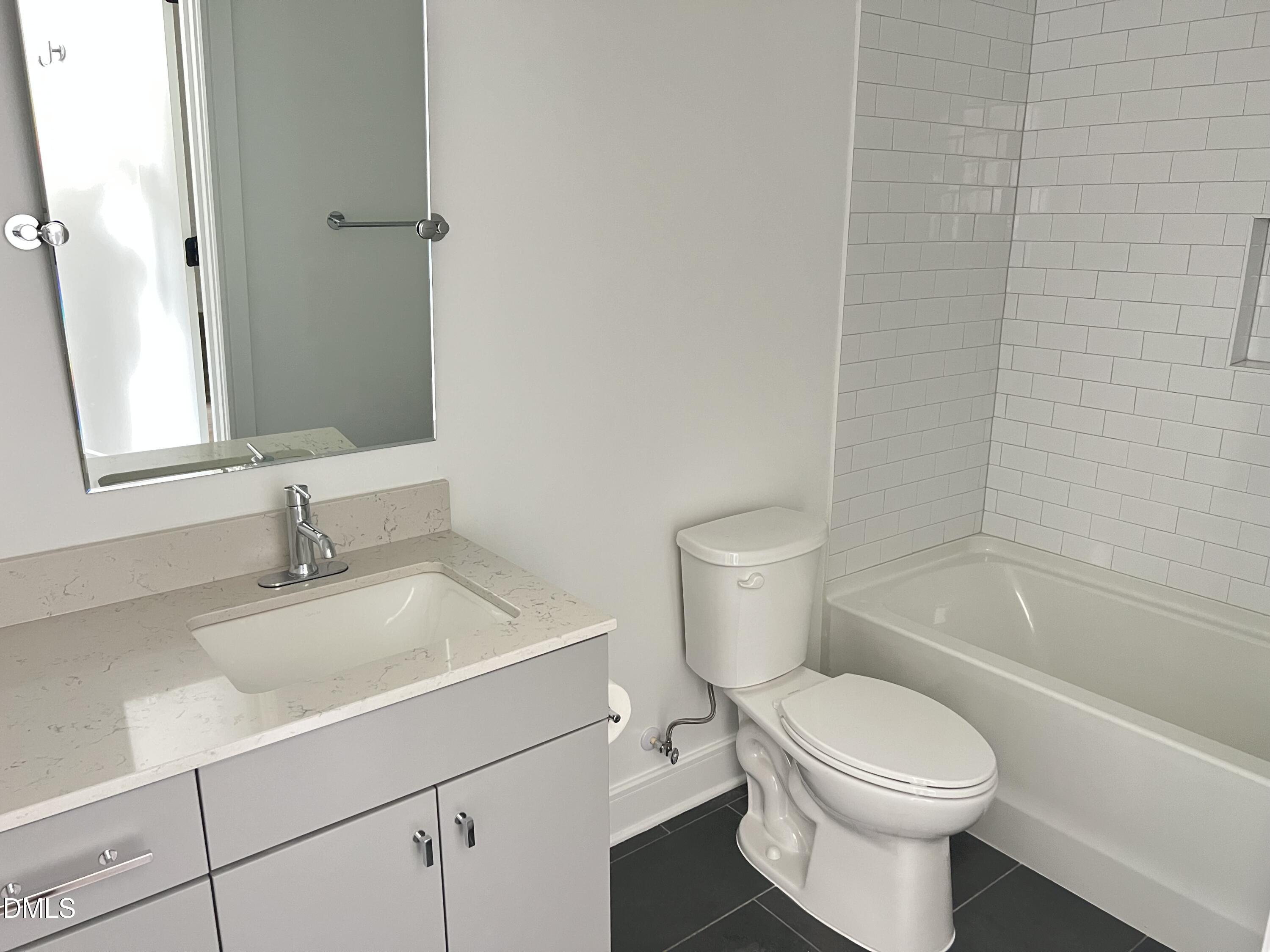615 Daniels Street, Unit 112 Raleigh, NC 27605 - Photo 6 of 13 IMG_4275