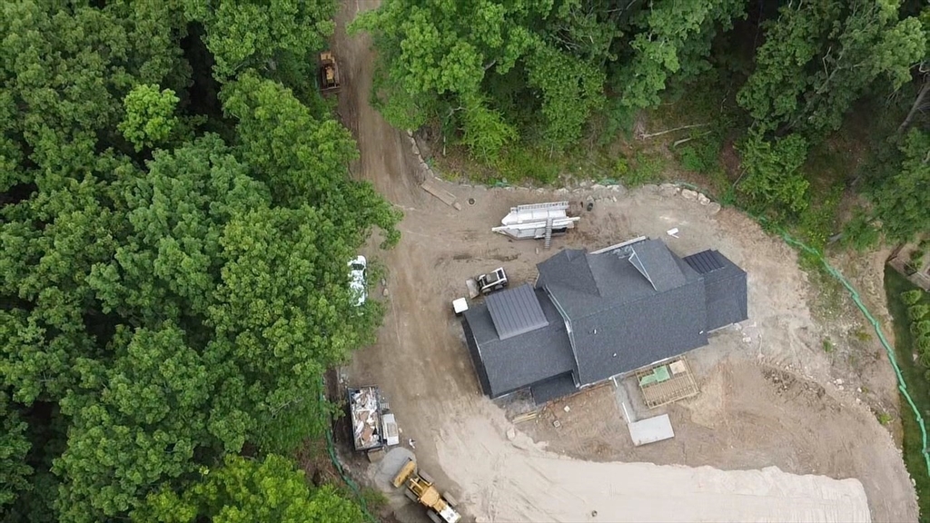 104 King George Drive Boxford, MA 01921 - Photo 12 of 19 an aerial view of a house with a yard