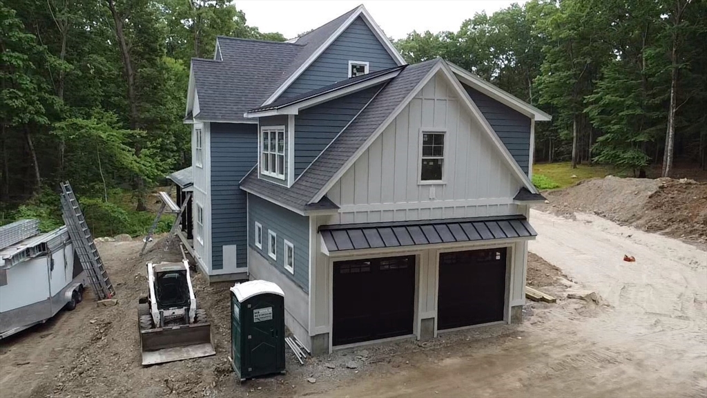 104 King George Drive Boxford, MA 01921 - Photo 13 of 19 a front view of a house with garden