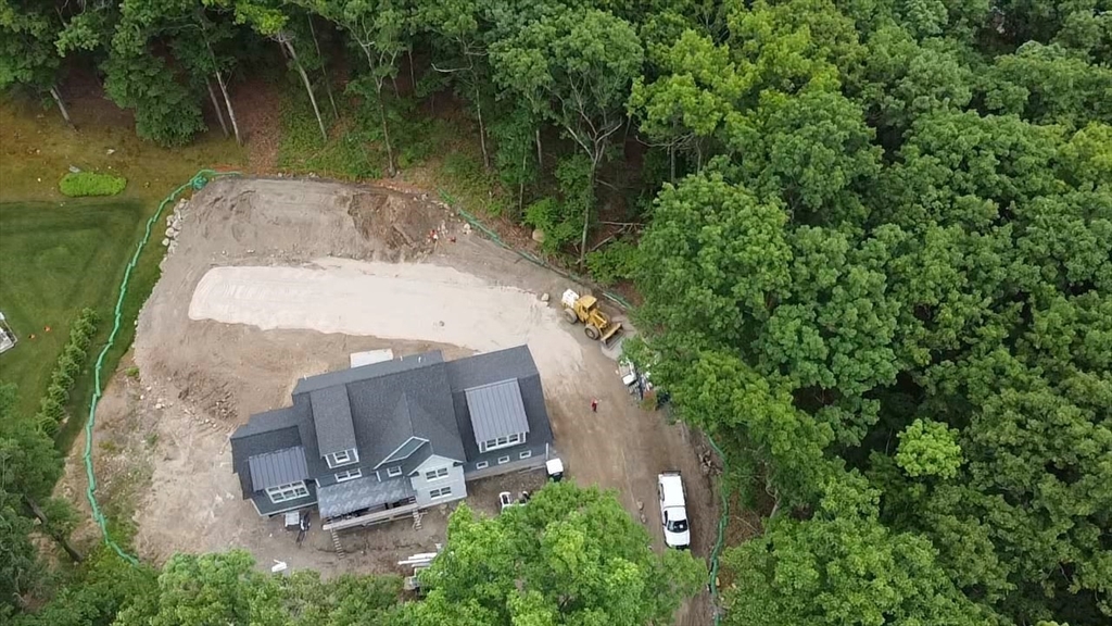 104 King George Drive Boxford, MA 01921 - Photo 2 of 19 an aerial view of a house with a yard and lake view