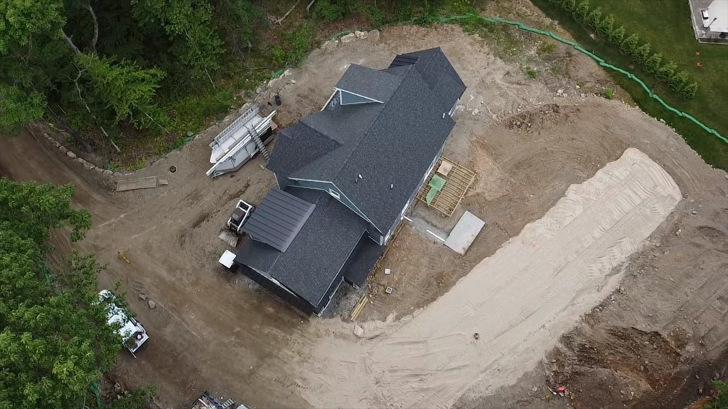 104 King George Drive Boxford, MA 01921 - Photo 8 of 19 an aerial view of a house with a yard