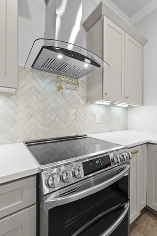 a kitchen with a sink and a microwave