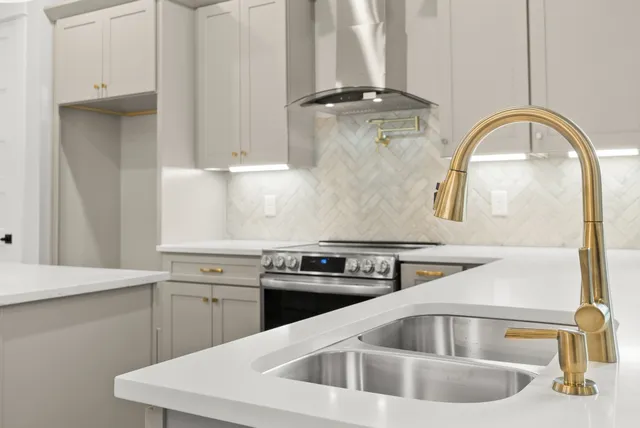 a view of kitchen and dining room with a fireplace