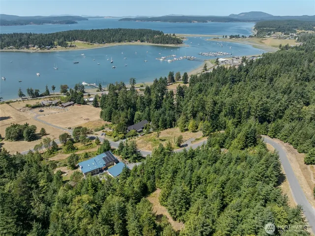an aerial view of multiple house with outdoor space
