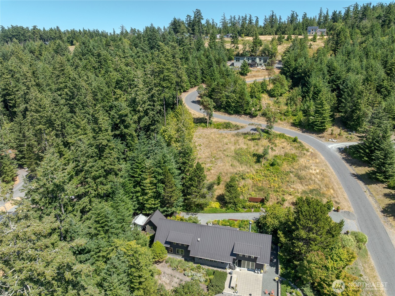 295 Rum Runner Road Lopez Island, WA 98261 - Photo 7 of 37 an aerial view of a house with a yard