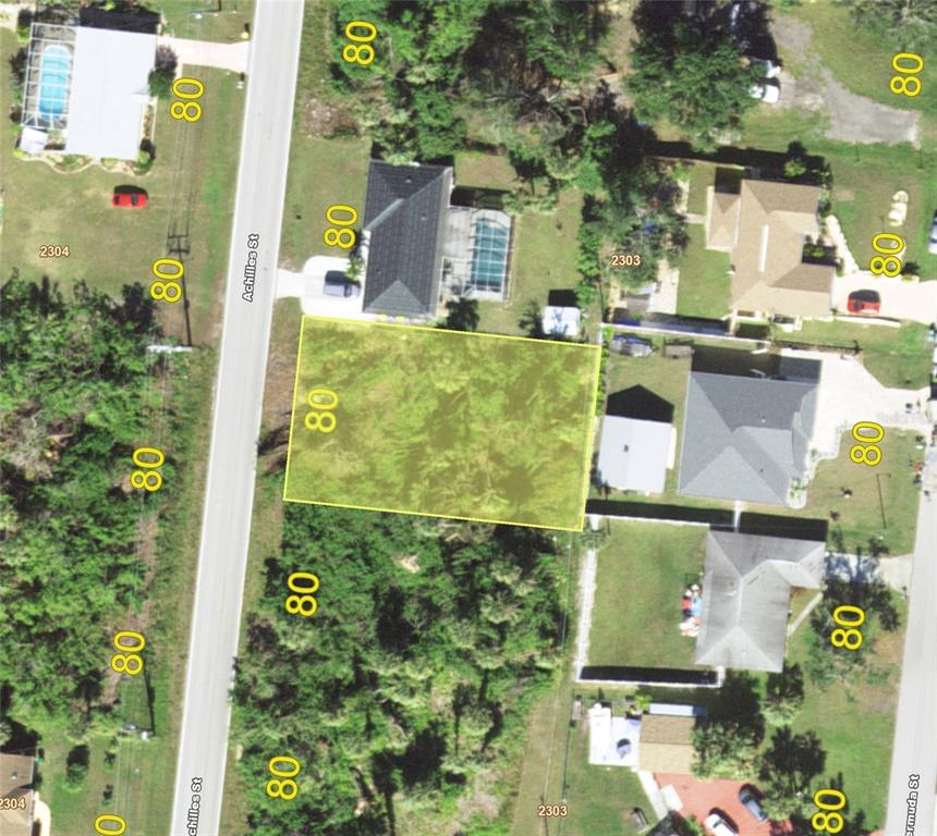 aerial view of a house with a garden
