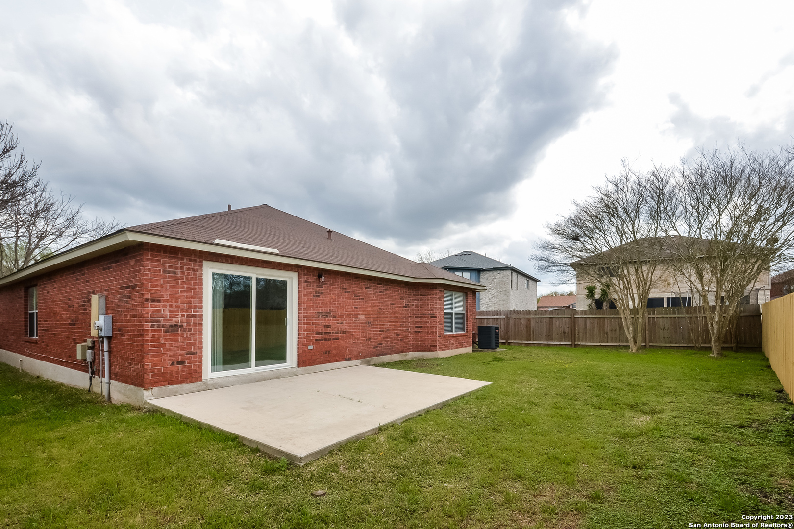 8007 Manderly Place Converse, TX 78109 - Photo 15 of 15 a front view of a house with a yard