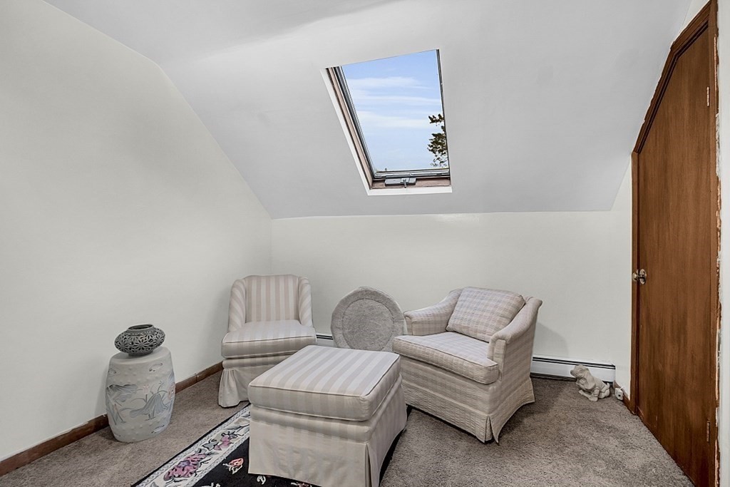 271 Broadway Haverhill, MA 01832 - Photo 15 of 26 a living room with furniture and a window