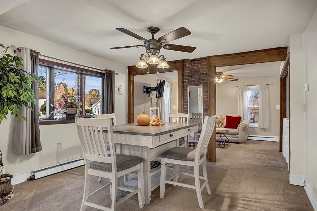 271 Broadway Haverhill, MA 01832 - Photo 7 of 26 a view of a dining room with furniture window and outside view