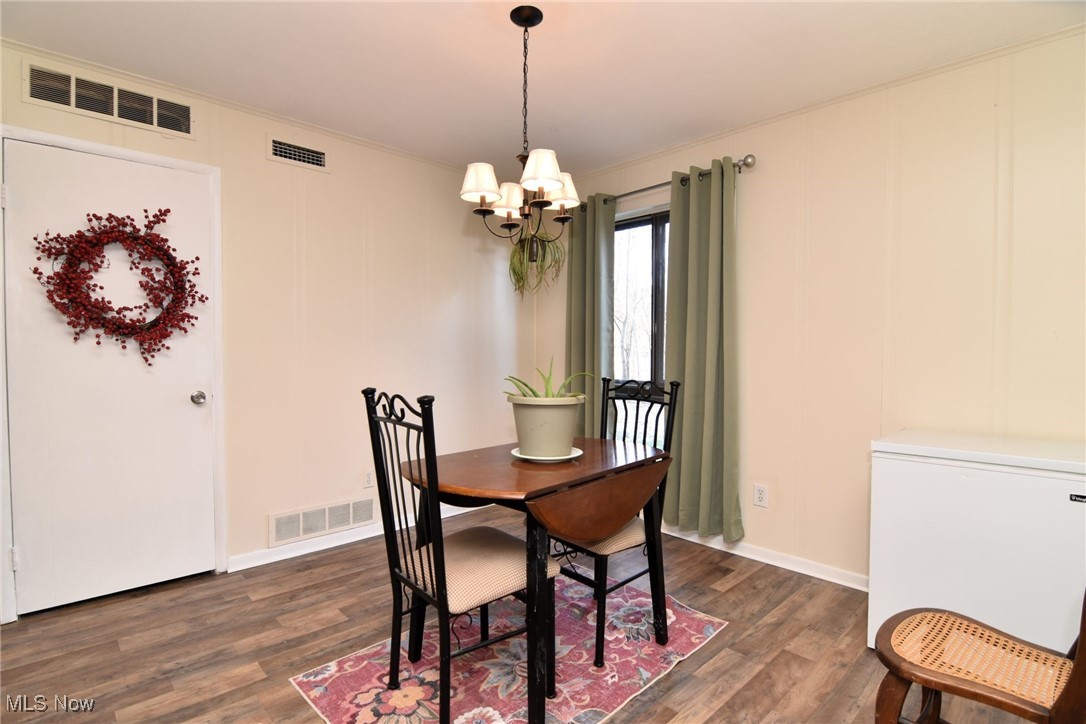 1105 Canyon View Road, Unit 602 Northfield, OH 44067 - Photo 8 of 31 Dining space featuring dark wood-type flooring