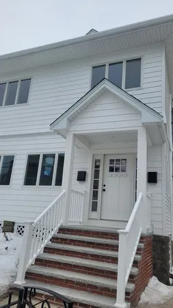 a view of a house with a deck