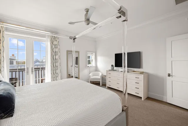 a view of a bathroom with a glass door and shower
