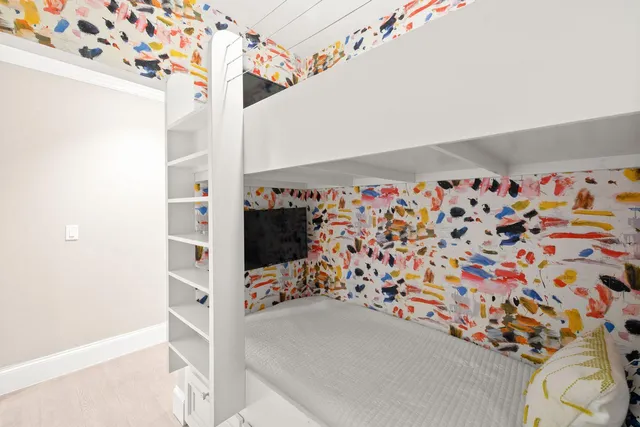 a view of a balcony with chair and table