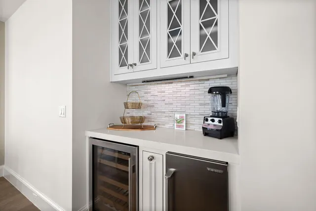 a view of a balcony with furniture