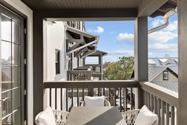 a lobby with furniture and a potted plant