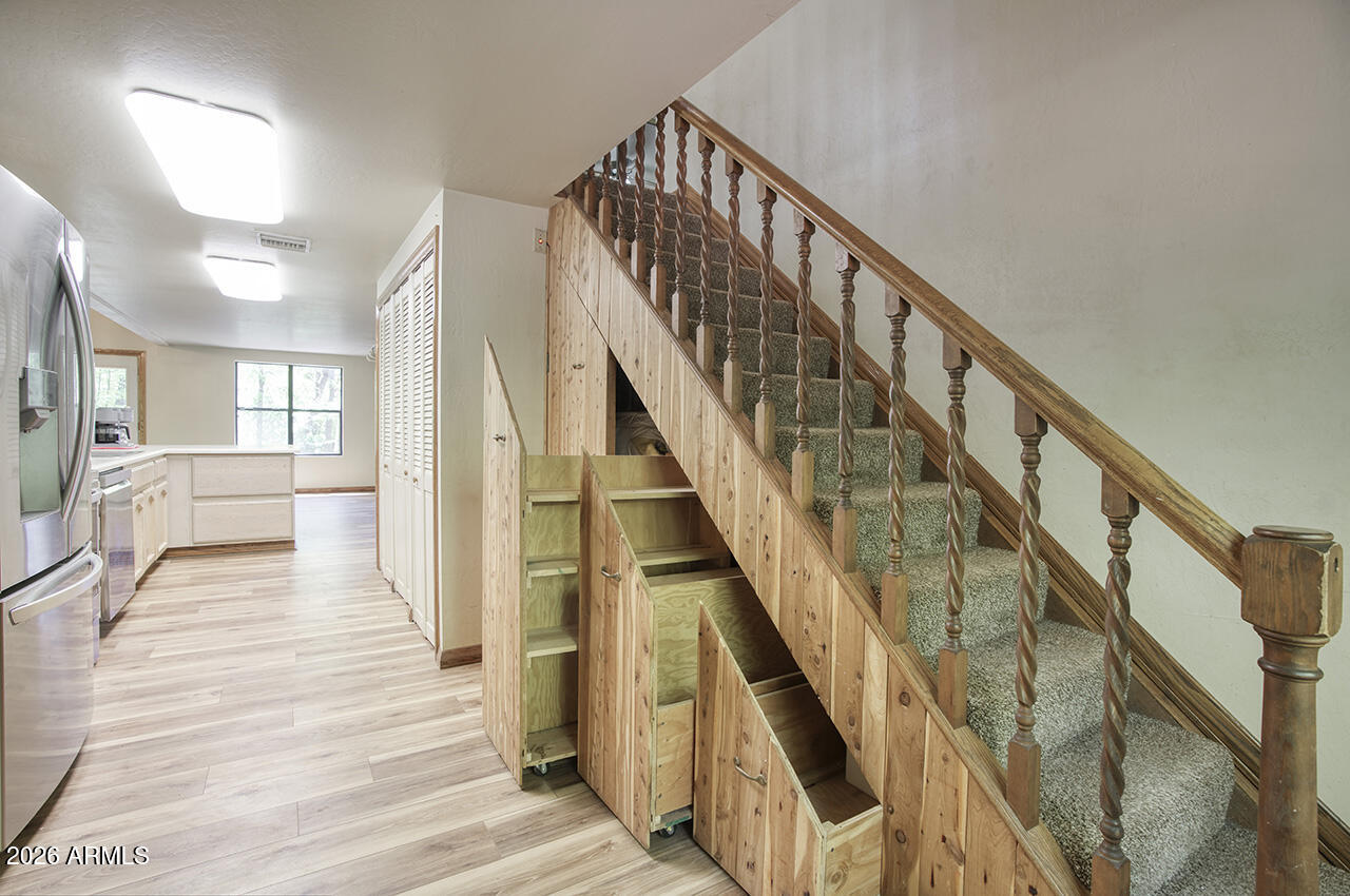 387 West Columbine Road Payson, AZ 85541 - Photo 22 of 40 Pull-Out Storage Under Stairs