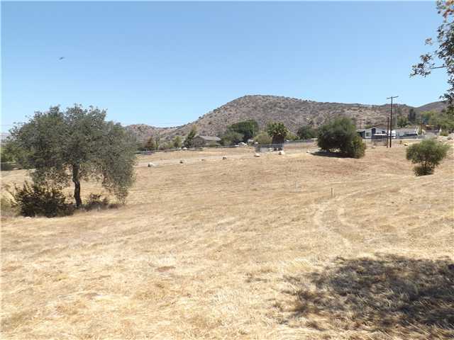 14420 Rios Canyon Road El Cajon, CA 92021 - Photo 16 of 25 Another view of the lower pasture on the south side of the property. You can see the house in the top right part of the photo. Amazing acreage, almost 100% usable!