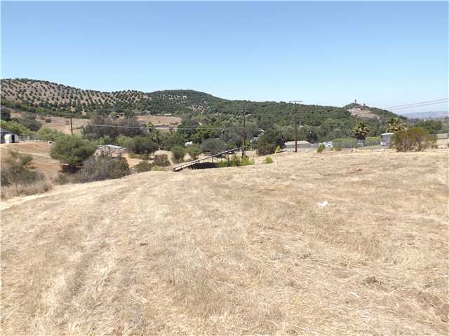 14420 Rios Canyon Road El Cajon, CA 92021 - Photo 21 of 25 South side of property, not fenced. You can see the solar panels in the center of the picture. Amazing Views!