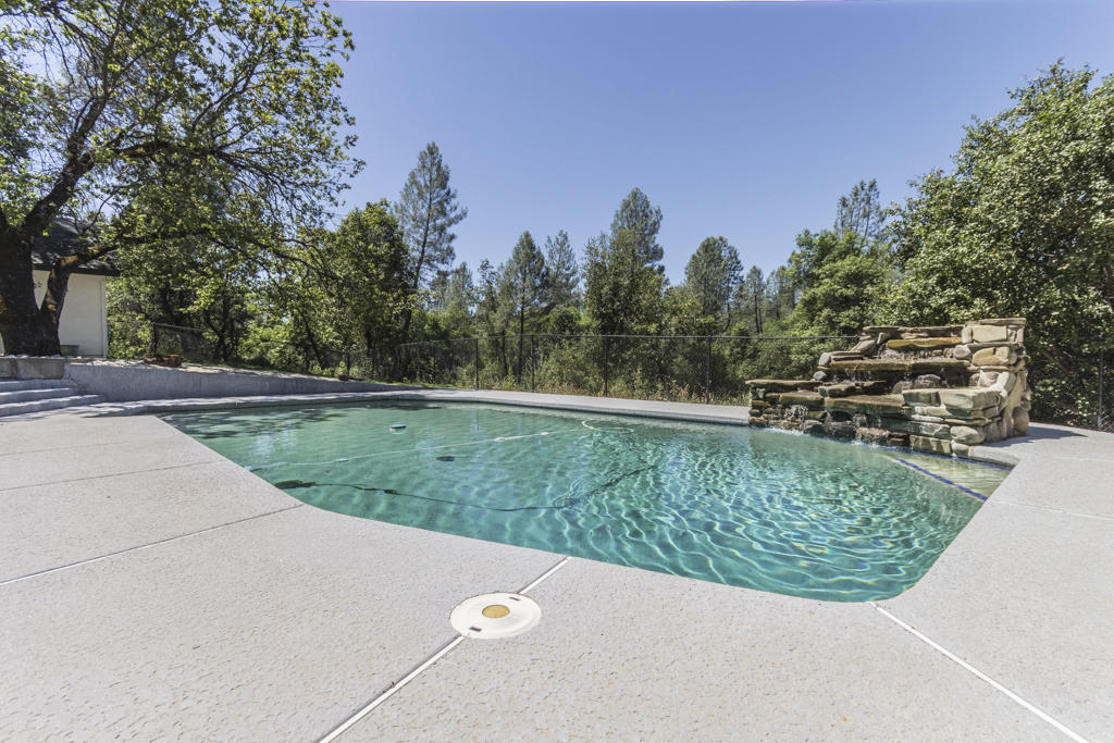 10050 Tilton Mine Road Redding, CA 96001 - Photo 2 of 35 pool with waterfall