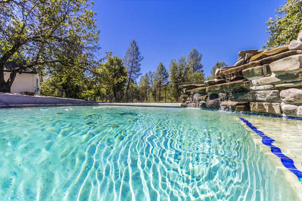 10050 Tilton Mine Road Redding, CA 96001 - Photo 28 of 35 pool with waterfall2