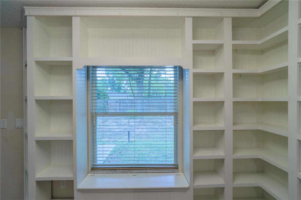 5273 Southwest 96th Place Ocala, FL 34476 - Photo 14 of 55 a view of walk in closet with empty racks