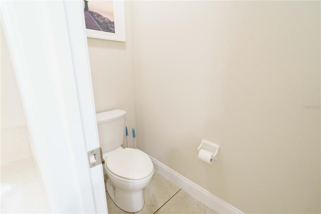 5273 Southwest 96th Place Ocala, FL 34476 - Photo 34 of 55 a white toilet sitting next to a white wall