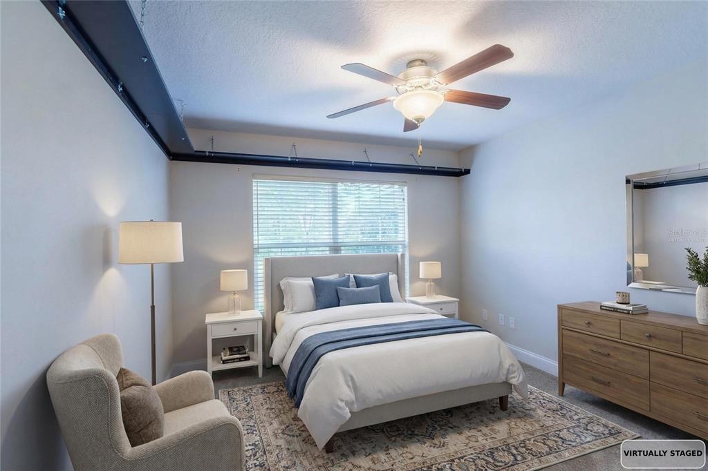 5273 Southwest 96th Place Ocala, FL 34476 - Photo 39 of 55 a bedroom with a bed and a couch